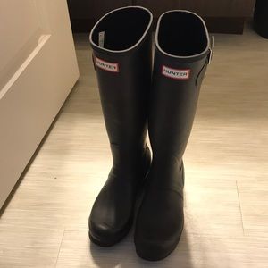 Tall matte black Hunter boots